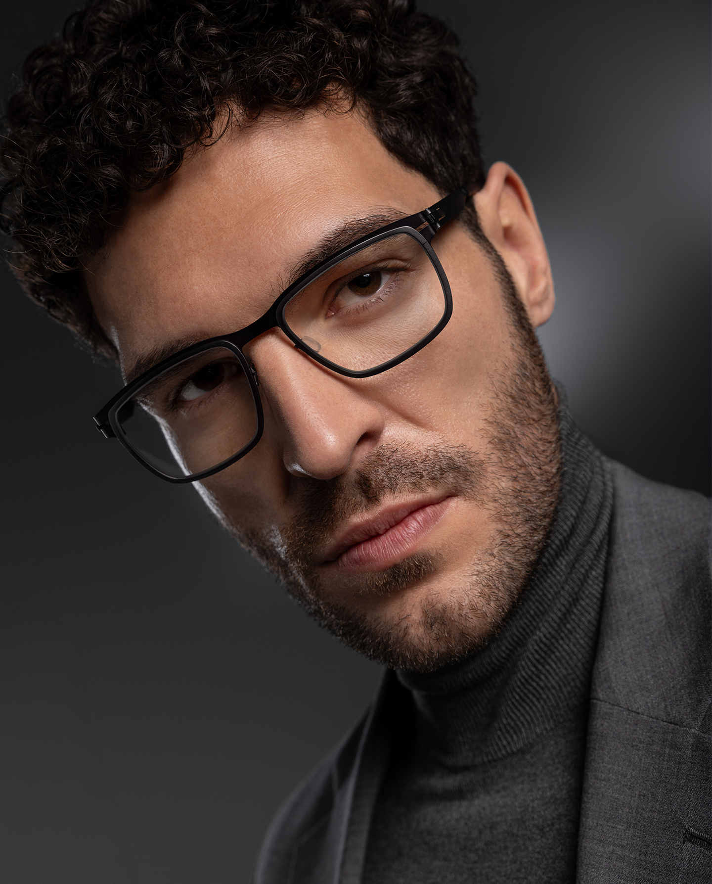 OVVO Optics Ti2 Hyperion optical frame portrait of a man wearing square titanium eyeglasses