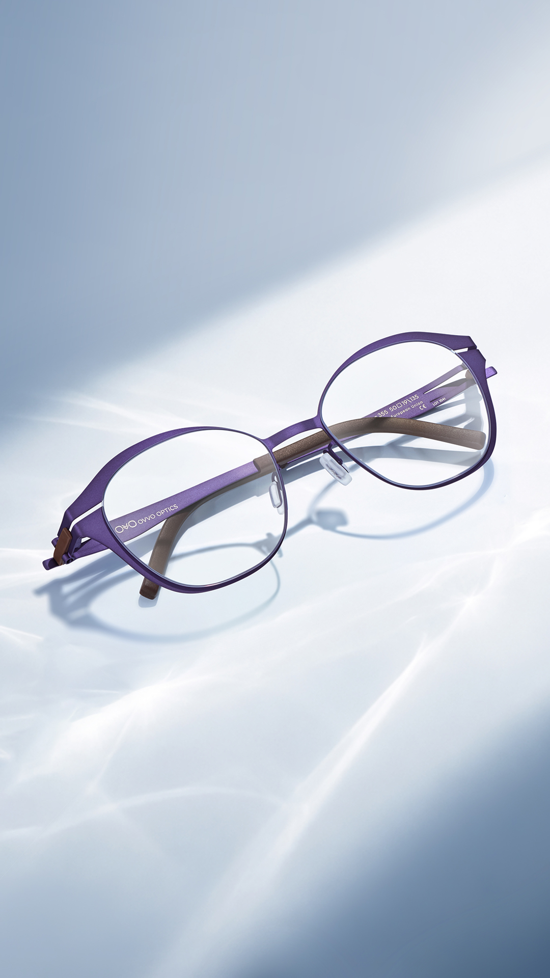 OVVO Optics purple geometric optical eyeglasses in a studio cover shot on a light background