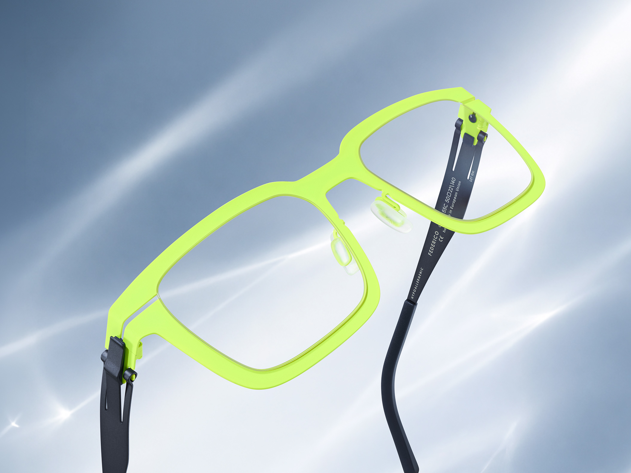 OVVO Optics orange rectangular optical frame with blue temples in a studio product shot