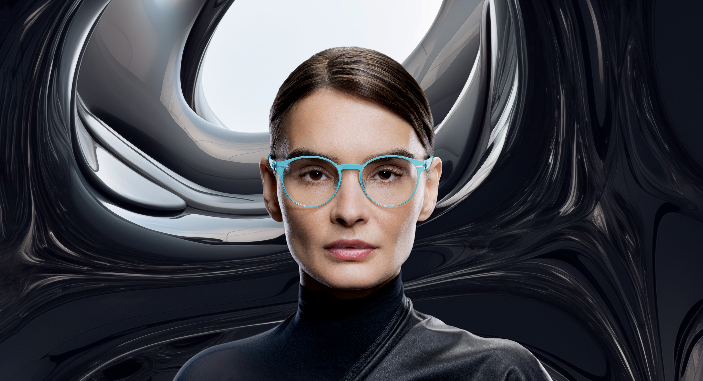 Close-up of premium OVVO Optics frames from the Surgical Steel and Titanium collection.