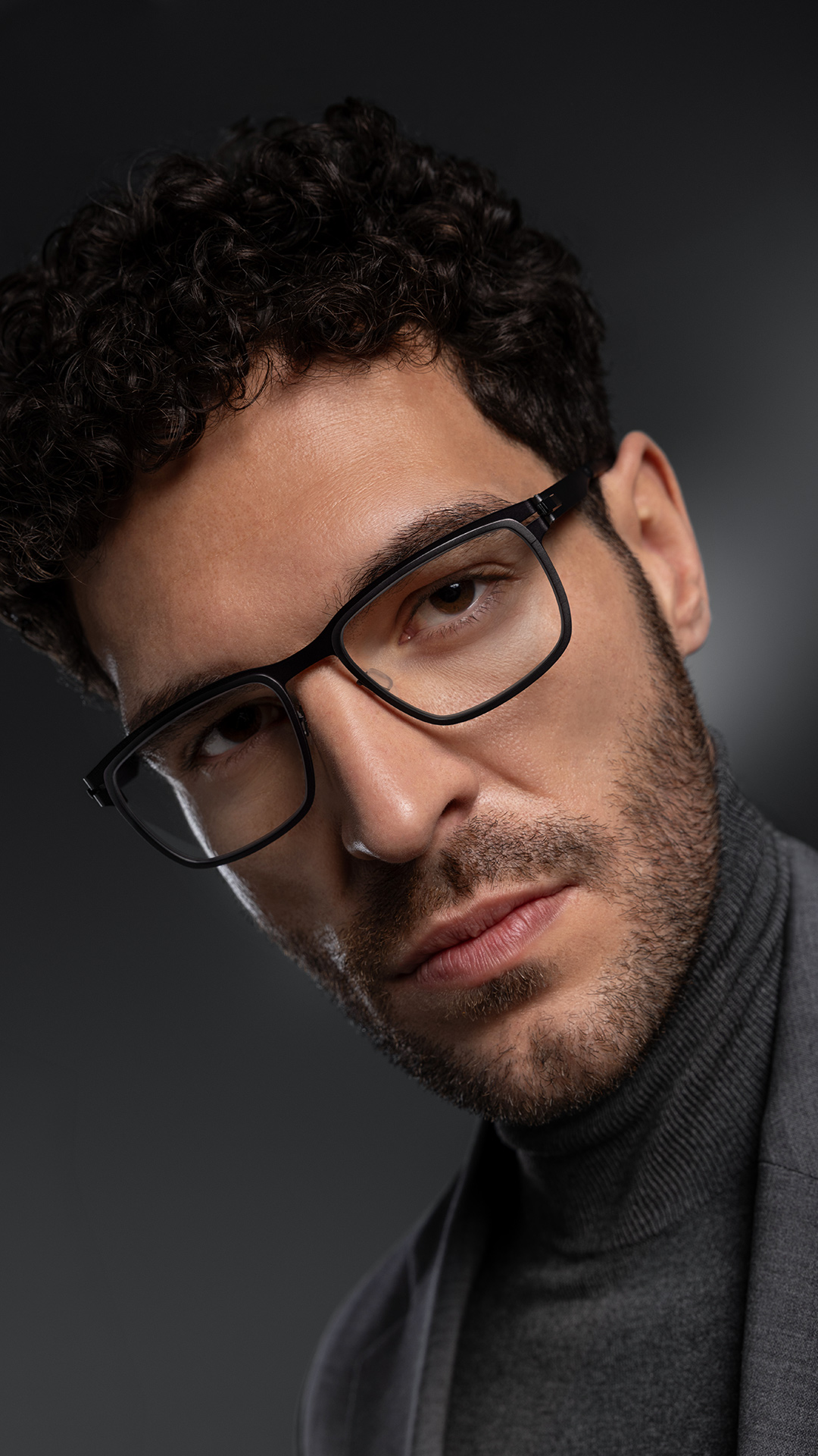 OVVO Optics Ti2 Hyperion optical frame portrait of a man wearing square titanium eyeglasses