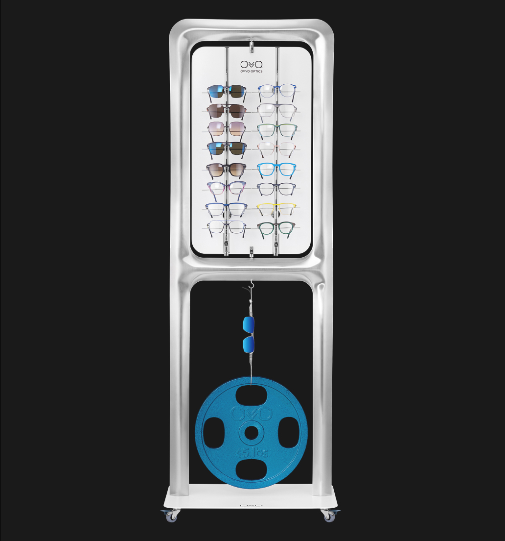 Flagship 32-piece double-sided rotatable eyewear display with 45 lb weight showcase.