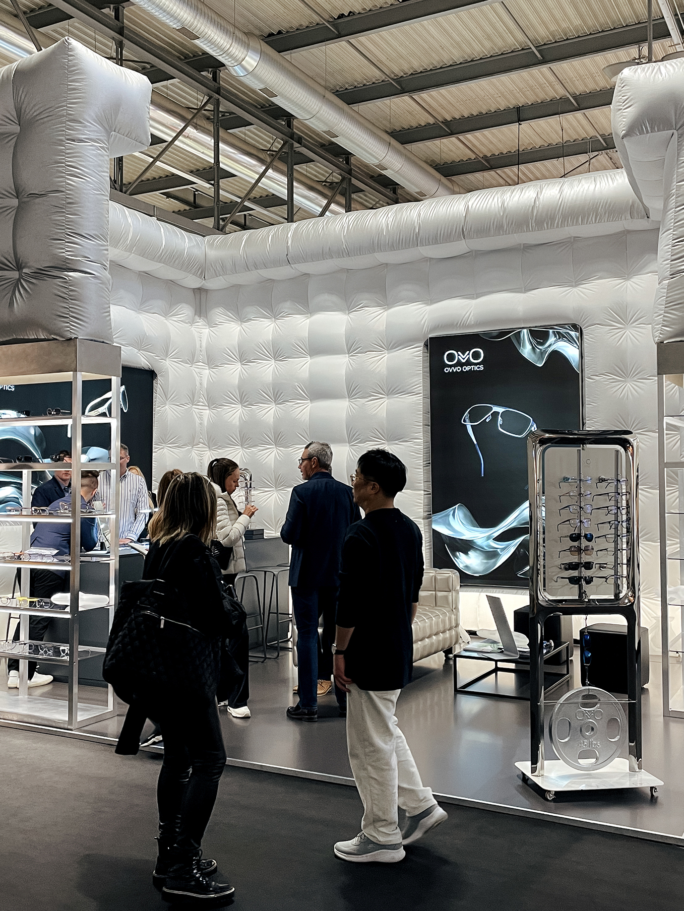 A large-scale OVVO Optics retail display showcasing premium eyewear frames in an authorized dealer location.